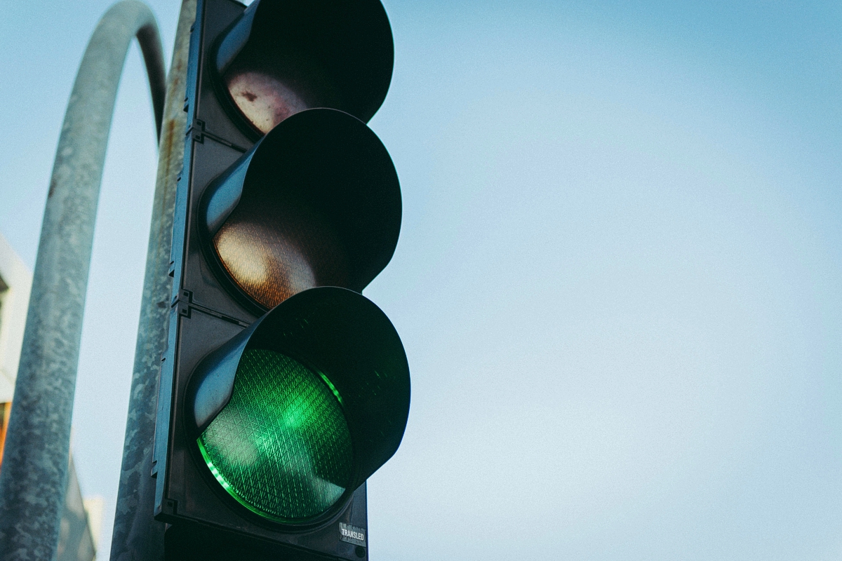 Photo of traffic light showing green